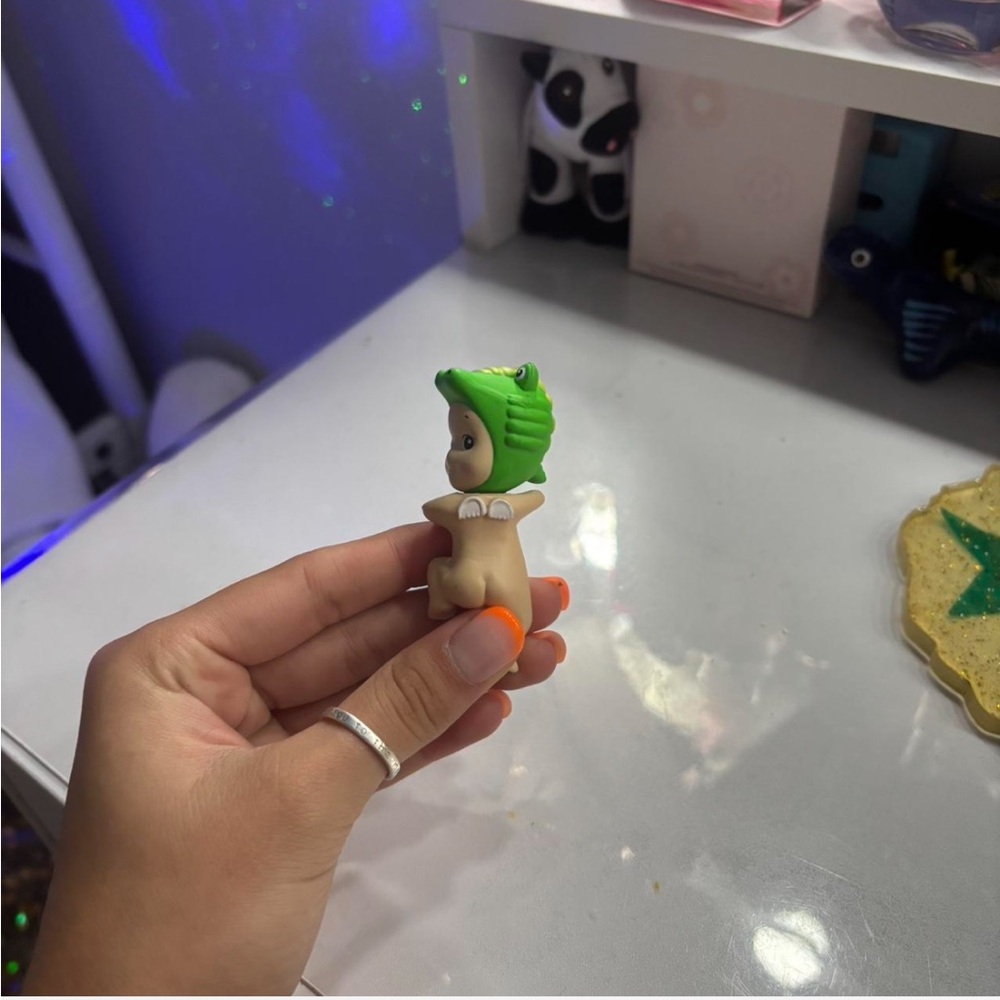 Adorable Green and Orange Dinosaur Toy